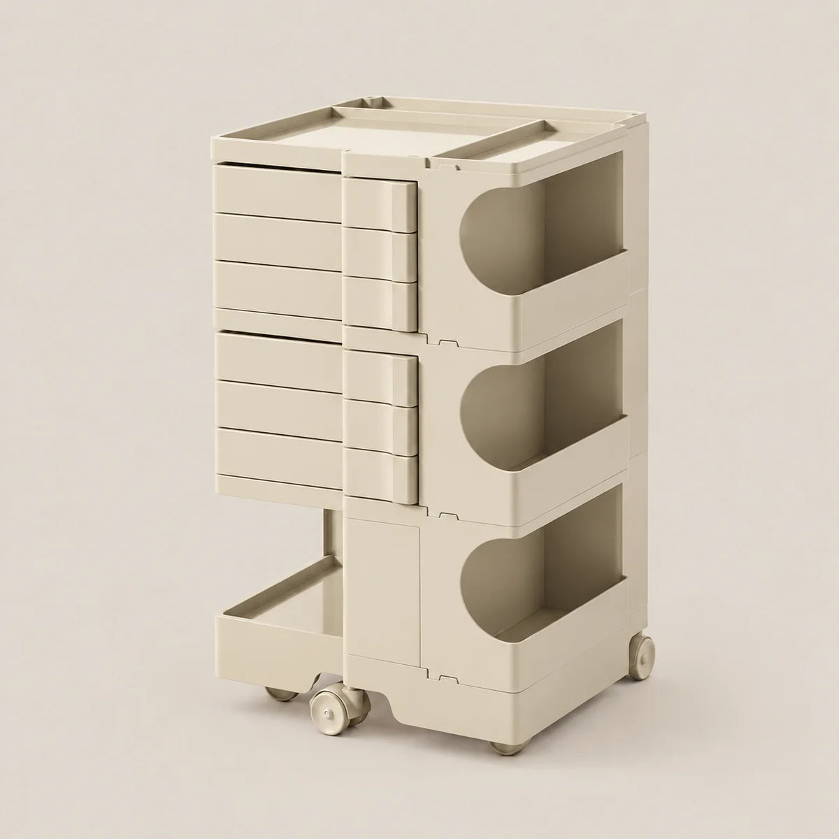 A cream-colored modular storage cart with multiple drawers and open shelves, shown on a clean, solid, warm beige background.