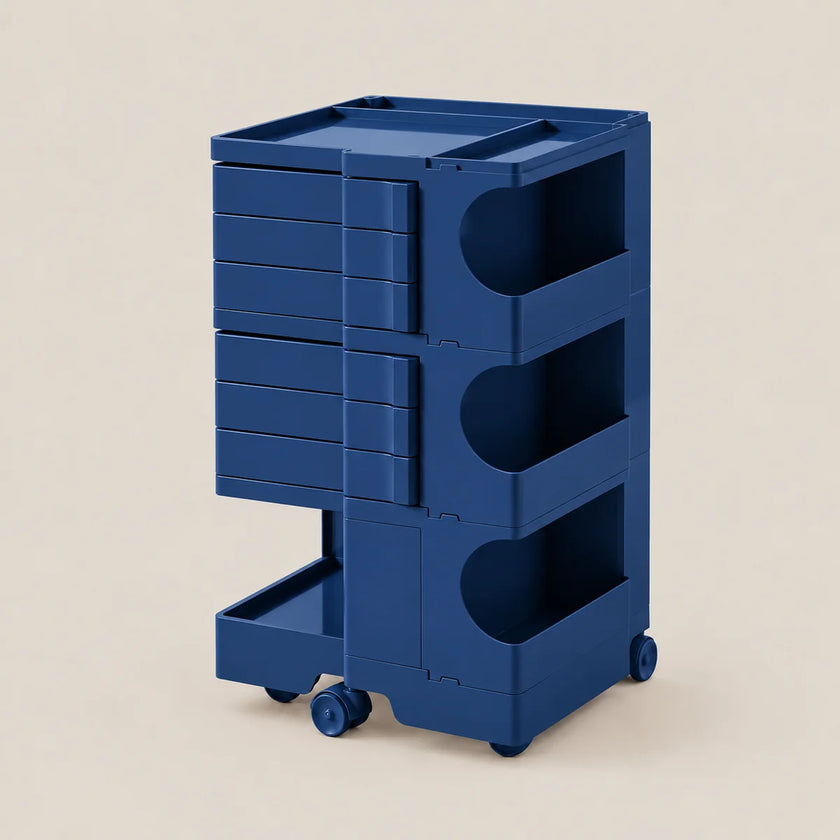A dark blue rolling utility cart with multiple drawers and open storage compartments, shown on a plain beige background.