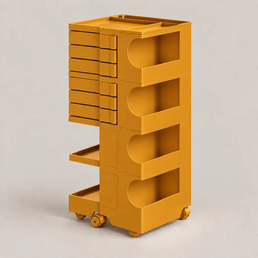 A mustard yellow modular rolling storage cart with multiple drawers and open shelves, shown on a neutral light gray background.