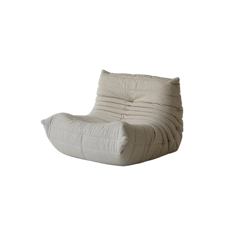 Beige bean bag chair on a white background