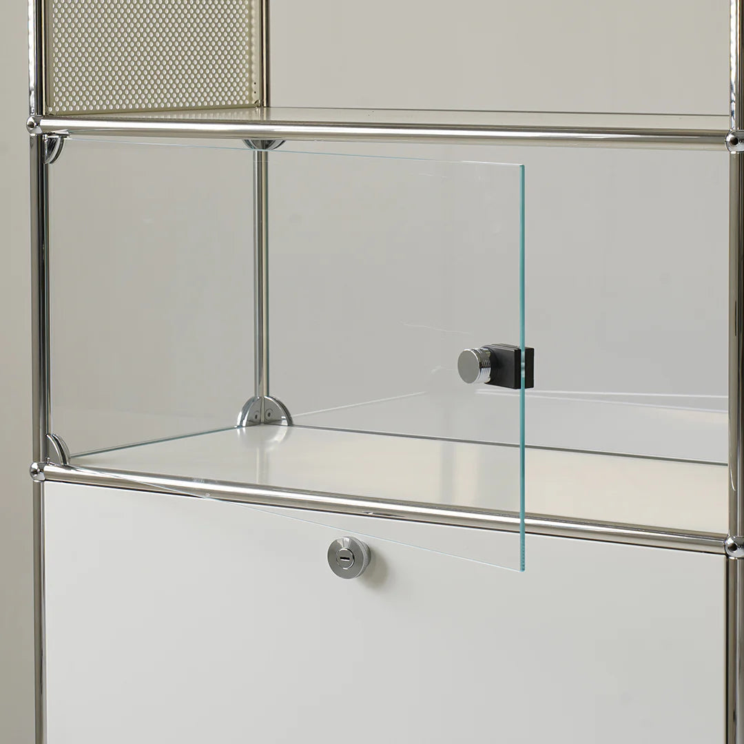 Glass display case with metal frame on a neutral background