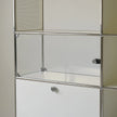 Metal shelving unit with glass shelves on a neutral background