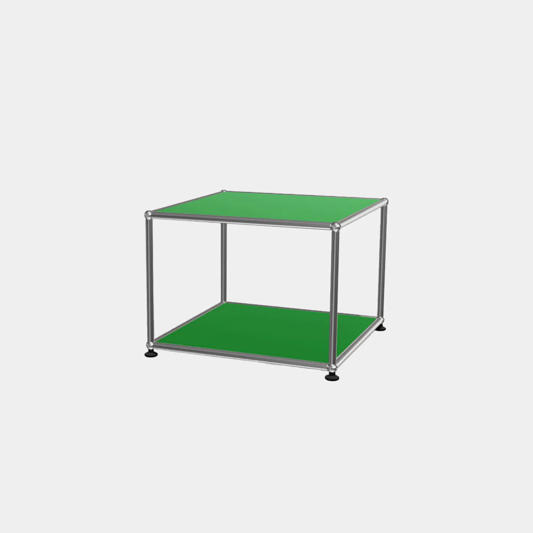 Green table with metal frame on a white background