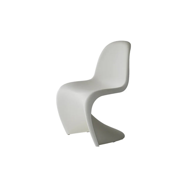 White chair with a wavy design on a white background