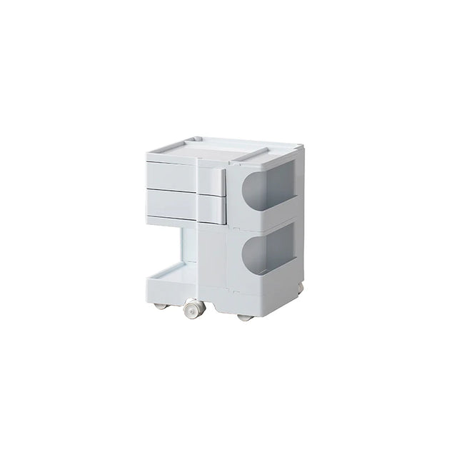 White rolling cart with drawers on a white background
