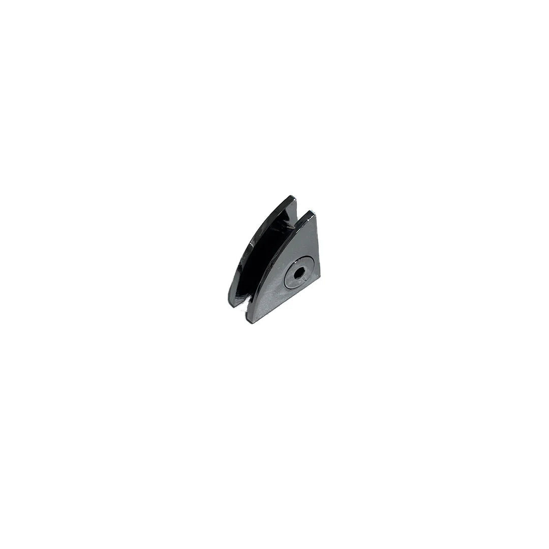 Small metallic object on a white background