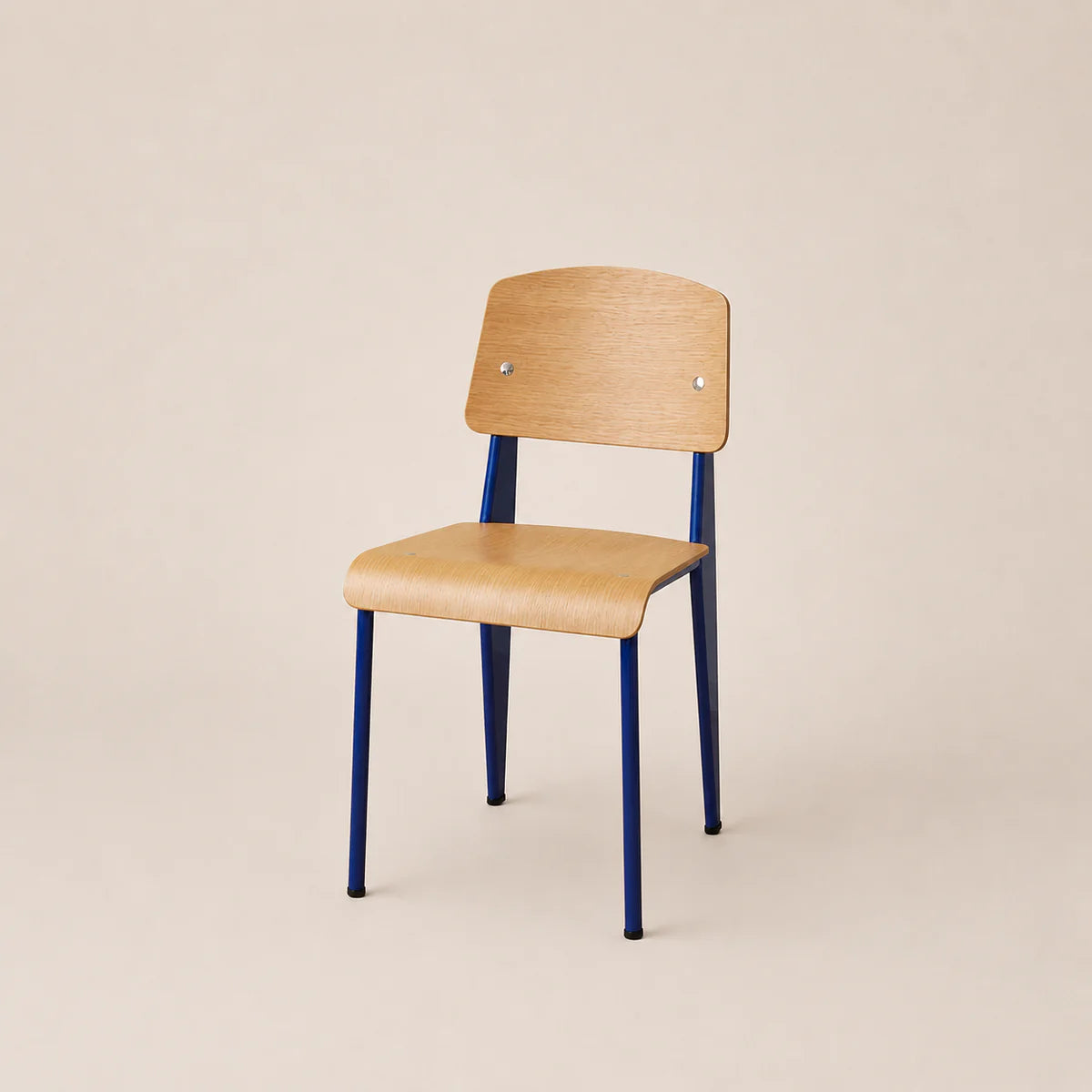 Chair with wooden seat and backrest and blue metal legs on a beige background