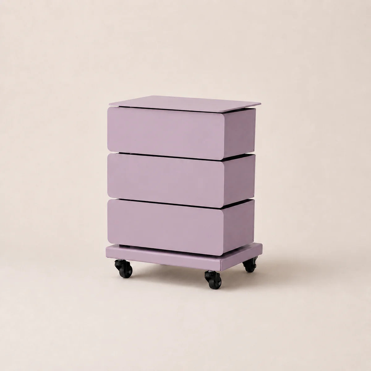 Purple rolling storage cart with three drawers on a beige background