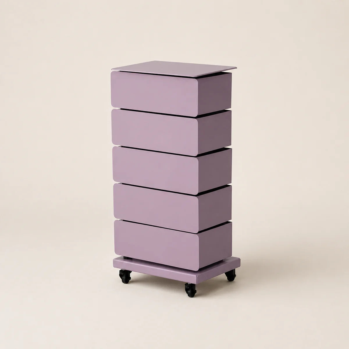 Purple drawer unit on wheels with four drawers against a beige background