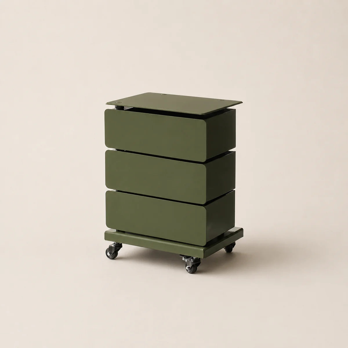 Green three-drawer rolling cart on a beige background