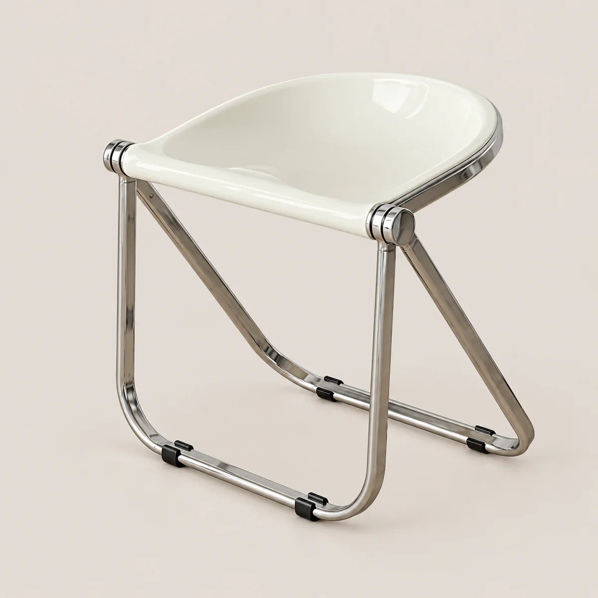 A modern folding chair with a glossy white molded seat and a polished chrome metal frame, shown on a solid light beige background.