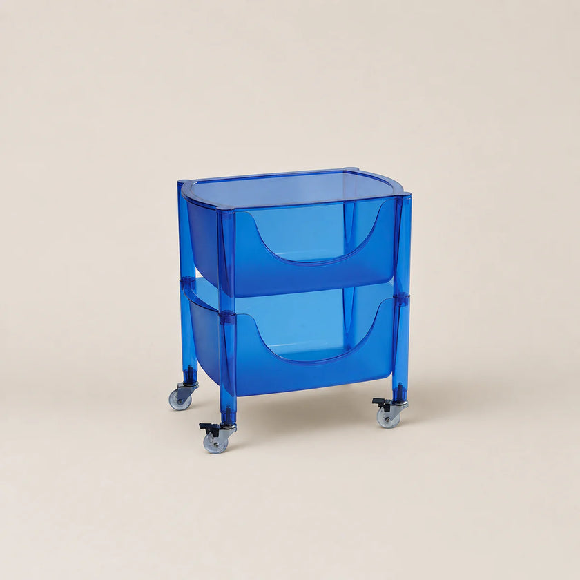 Blue rolling cart with transparent design on a beige background