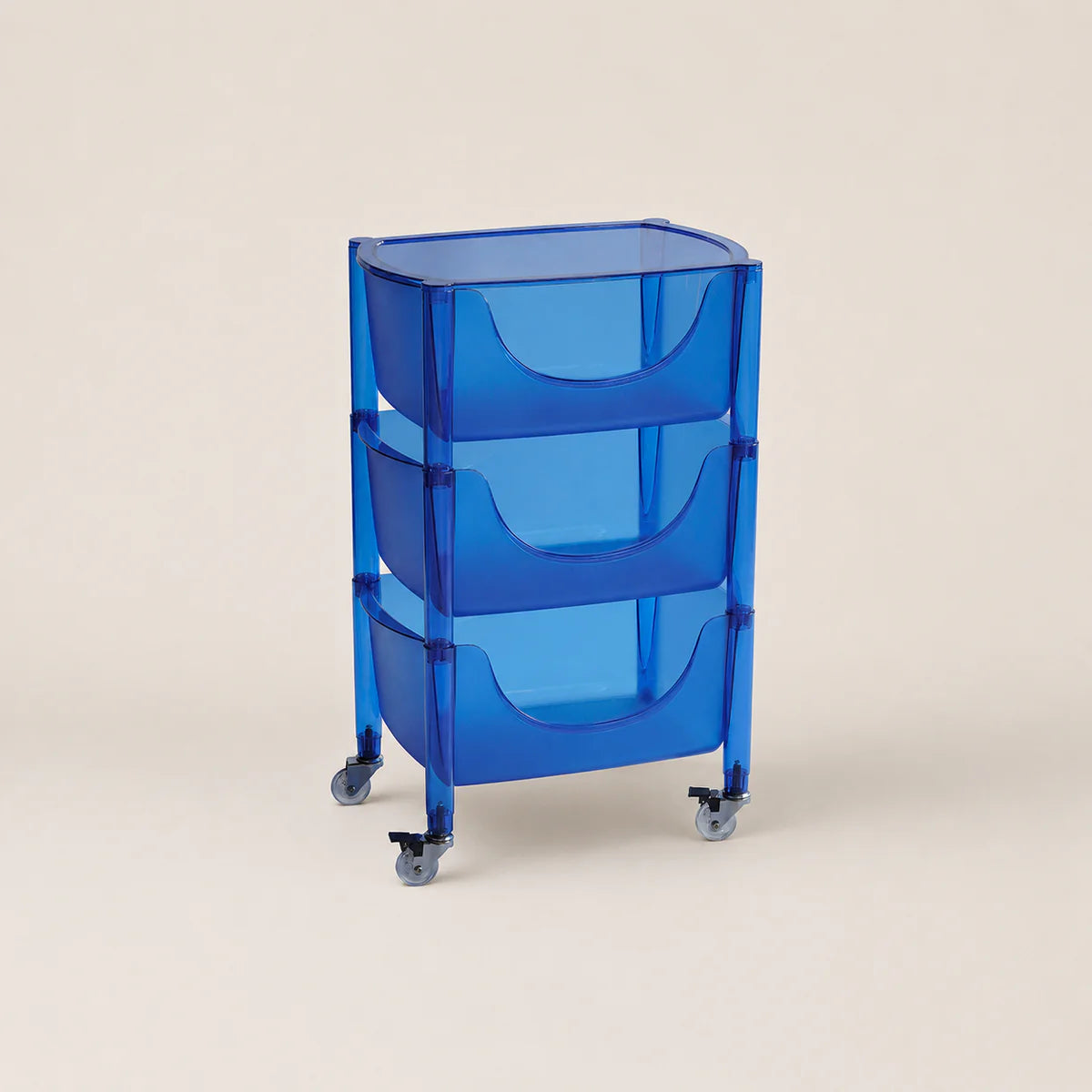 Blue rolling cart with three shelves on a beige background
