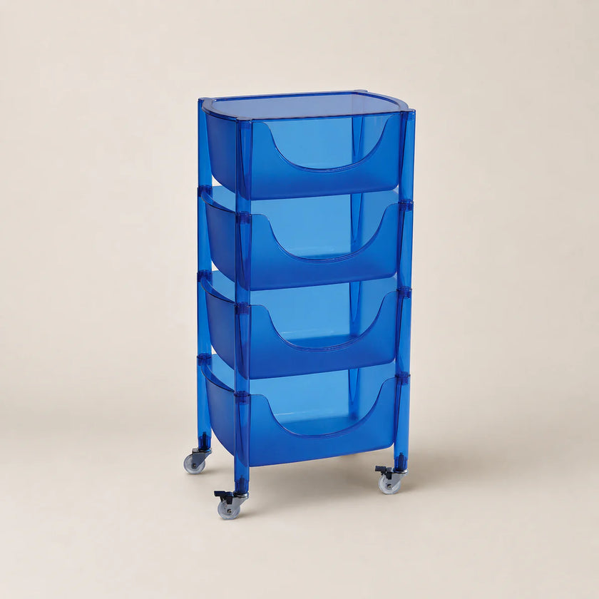 Blue rolling cart with transparent drawers on a beige background
