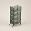 Gray rolling cart with four shelves on a beige background