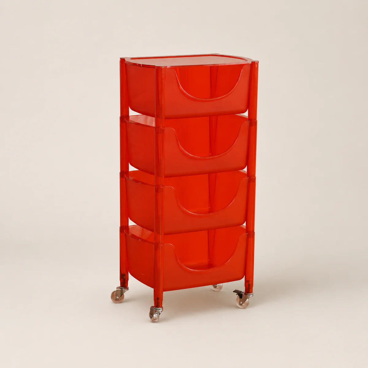 Red storage cart with four drawers on a beige background