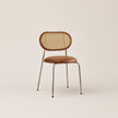 Chair with wicker backrest and brown seat on a beige background