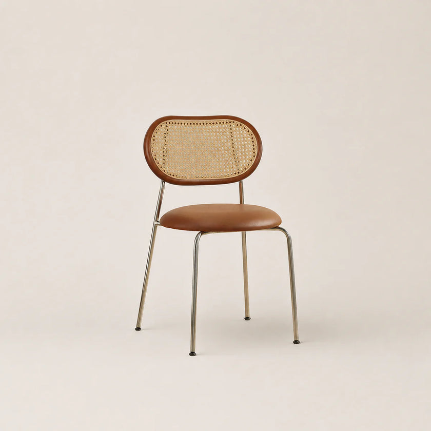 Chair with wicker backrest and brown seat on a beige background