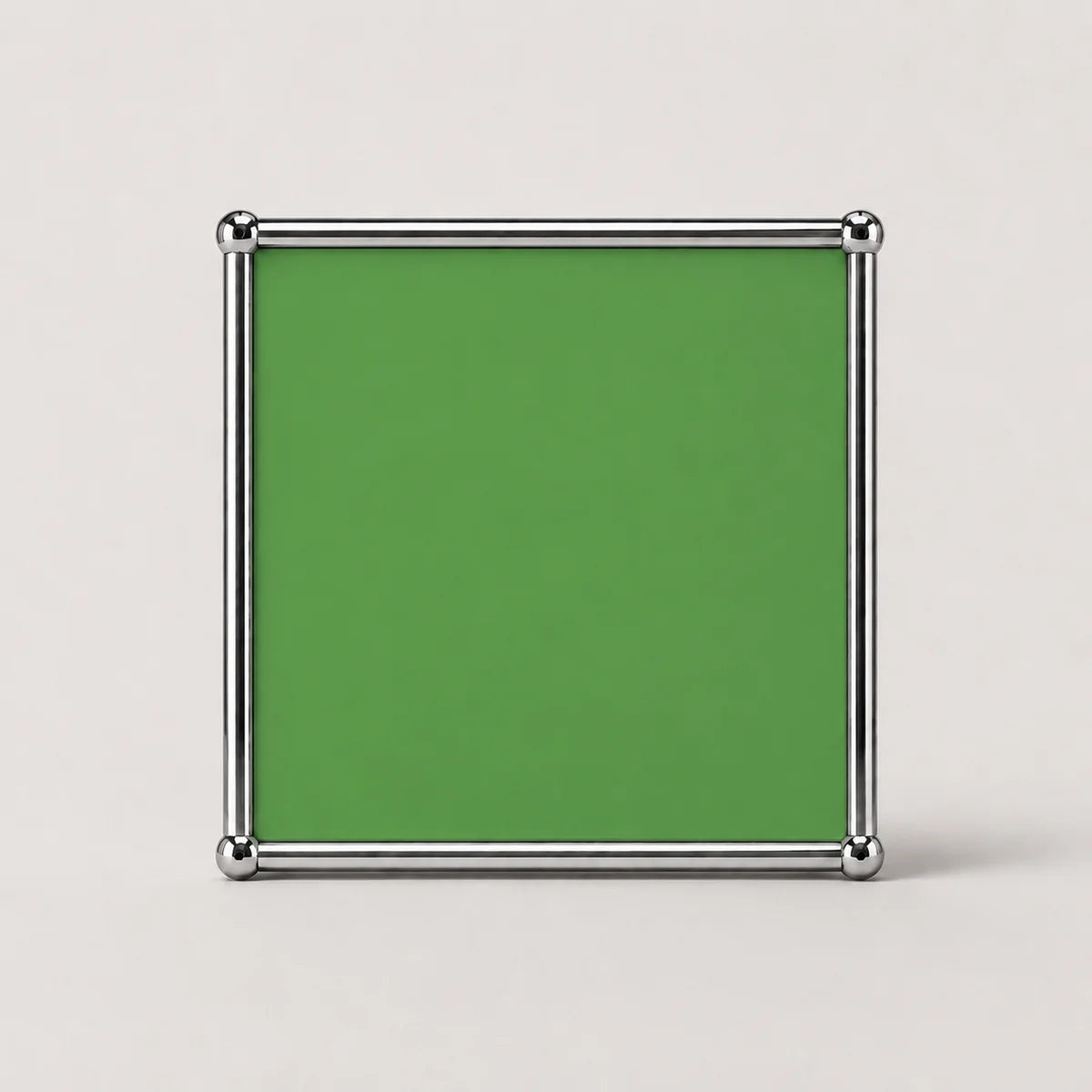 A 1.1mm green square panel accessory from the UF Nexus modular furniture series, surrounded by 304 stainless steel tubing and 8k polished chrome-plated brass connecting balls.