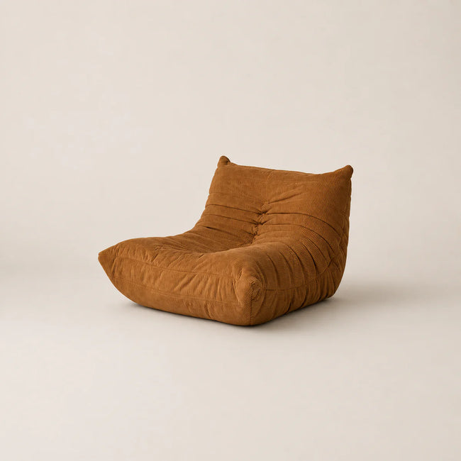 Brown bean bag chair on a beige background