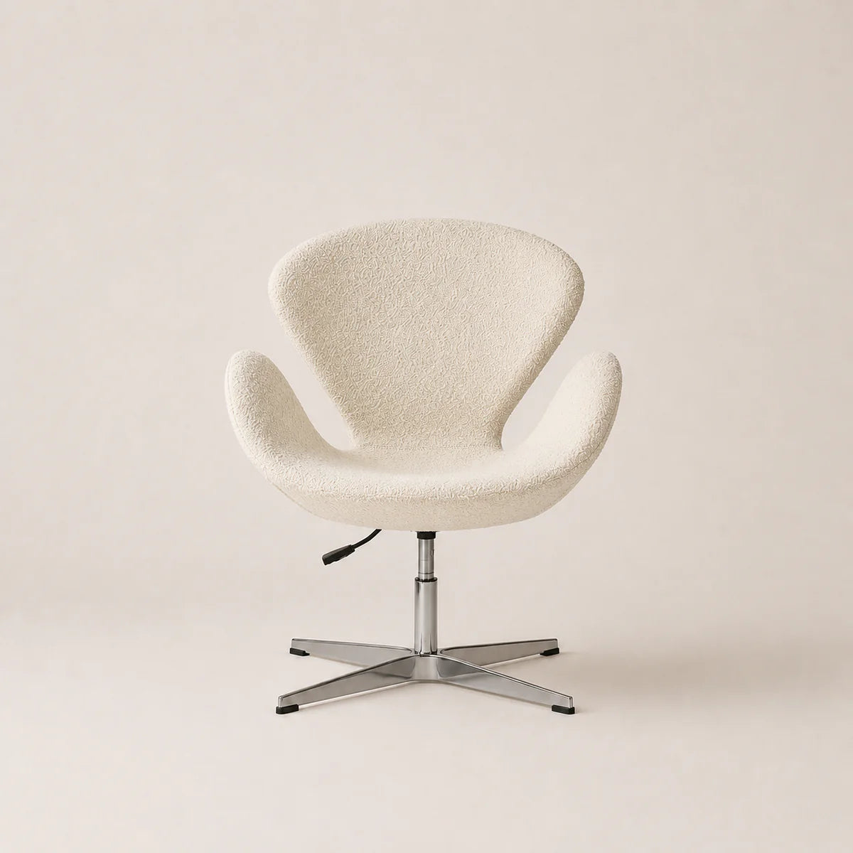 Beige swivel chair on a plain background