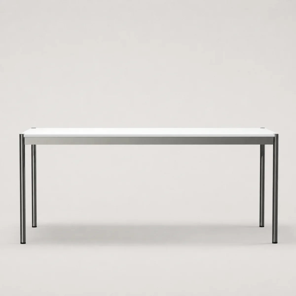 A minimalist rectangular table with a white top and slim metal legs, shown against a neutral light gray background.
