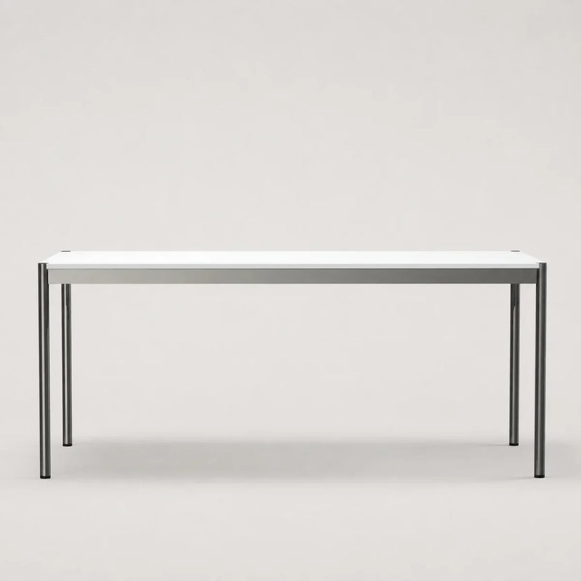 A minimalist rectangular table with a white top and slim metal legs, shown against a neutral light gray background.