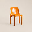 Orange chair on a beige background