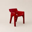 Red chair on a beige background