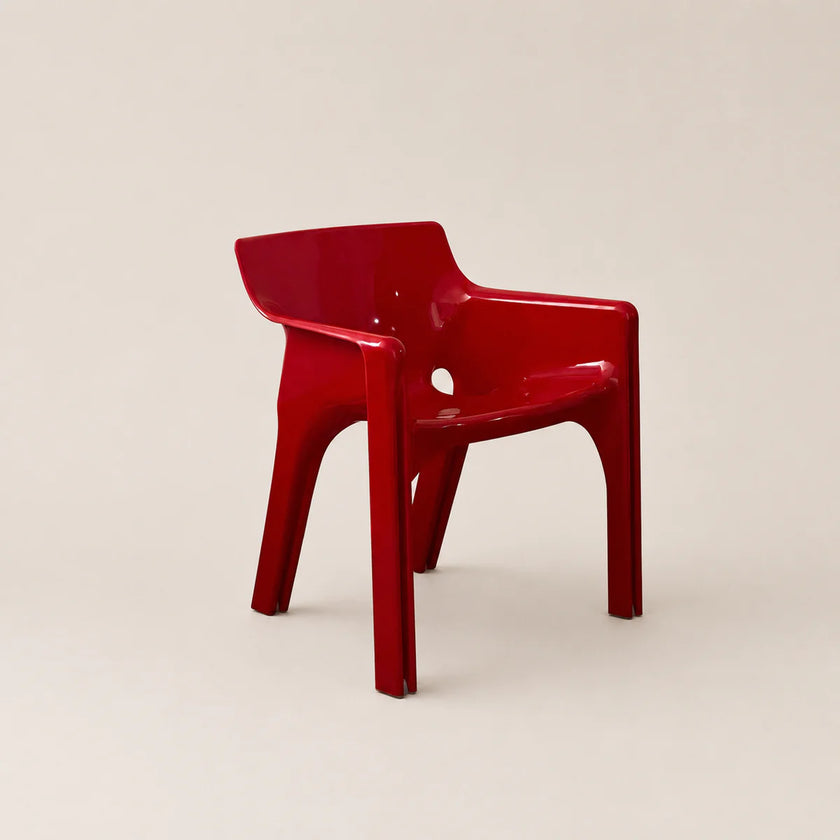 Red chair on a beige background