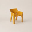 Yellow chair on a beige background