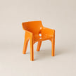 Orange chair on a beige background