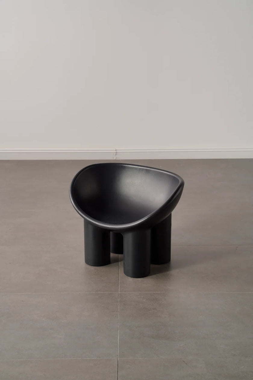 In the newly renovated living room, place a plastic kids chair, can also be used as kids toys or black toddler chair.