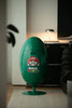 Green Super Mario shell-shaped house recycle bin in a room setting