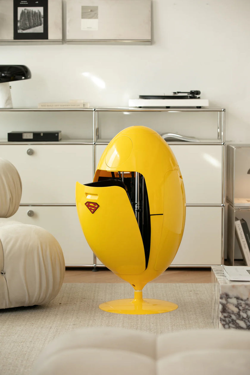 Yellow Superman-themed recycling bins in a modern living room setting.