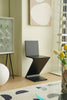 Modern black bar chair in a room with decor elements
