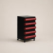 Black and red cylindrical storage unit on a beige background