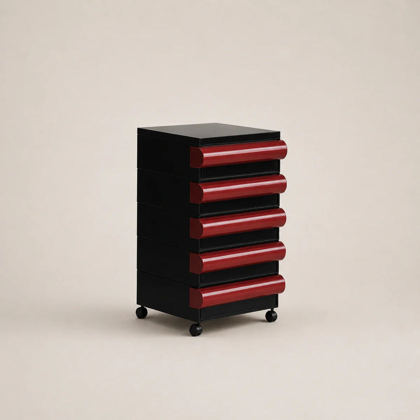 Black and red cylindrical storage unit on a beige background