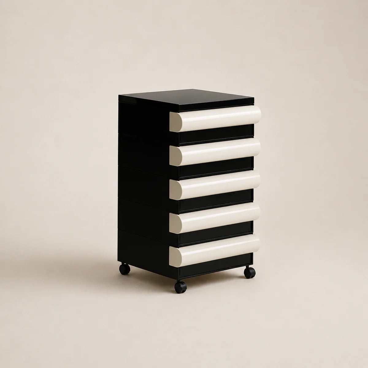 Black and white drawer unit on a beige background