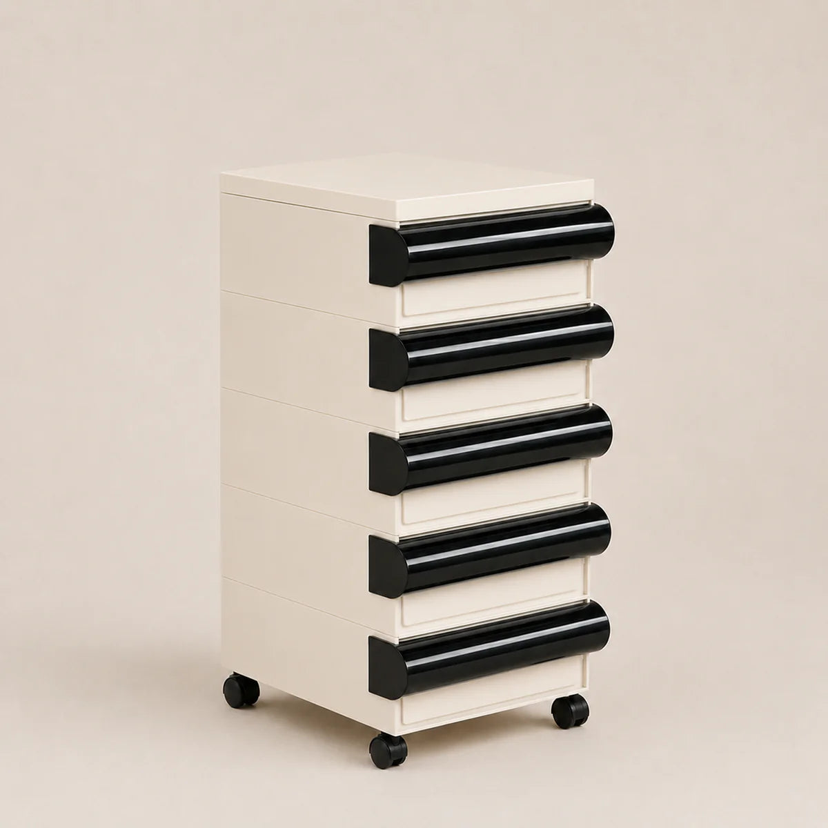 White and black drawer unit on wheels against a beige background