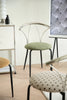 Modern metal chairs with green cushion in a minimalistic room