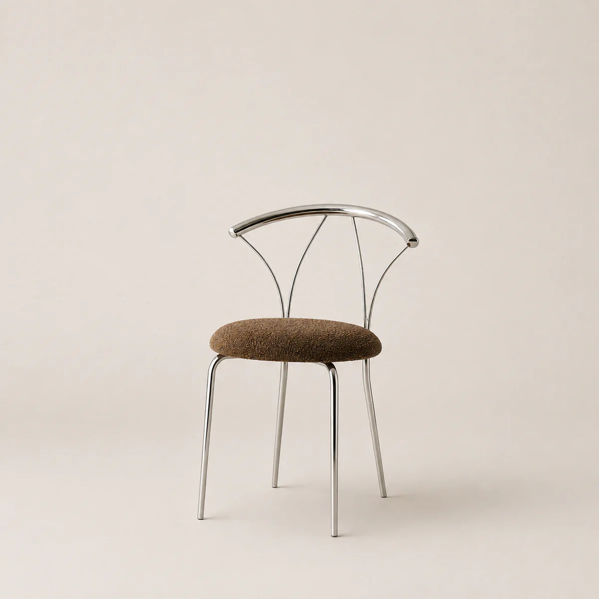Modern chair with metal frame and brown cushion on a beige background