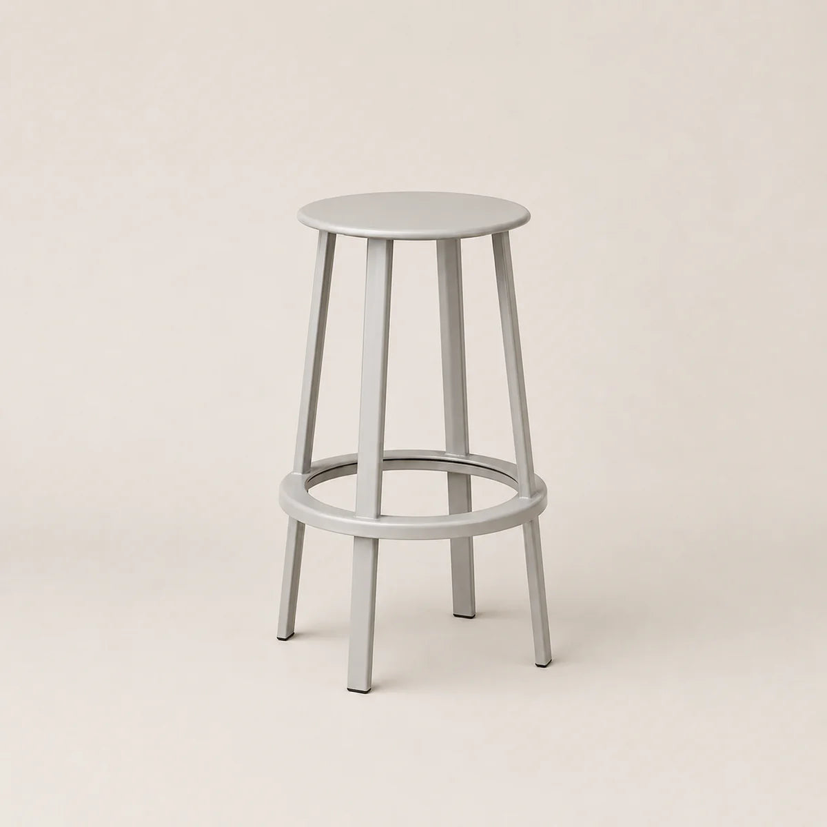 Gray bar stool on a beige background