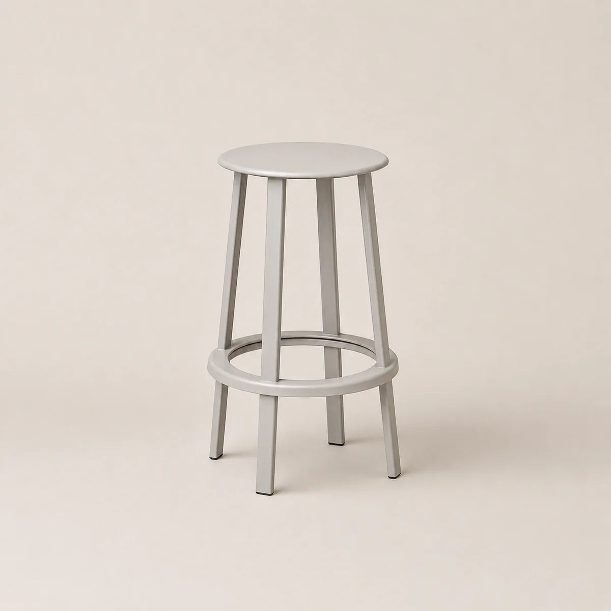 Light gray bar stool on a beige background