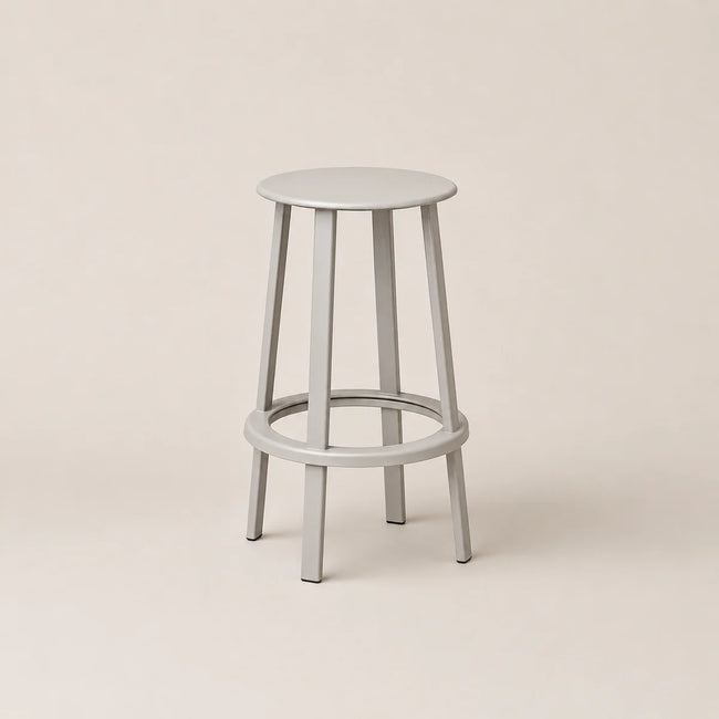 Light gray bar stool on a beige background