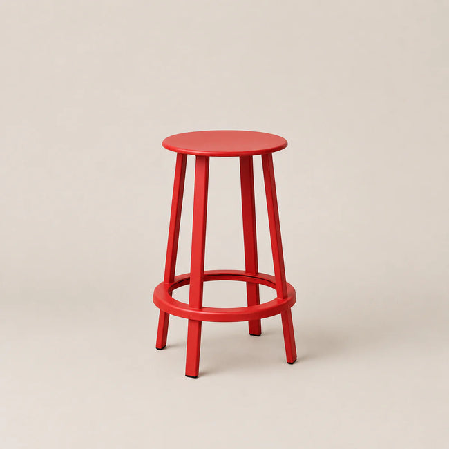 Red bar stool on a beige background