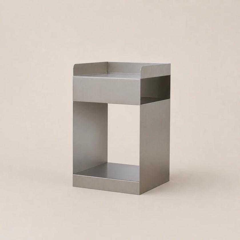 Metal side table on a beige background