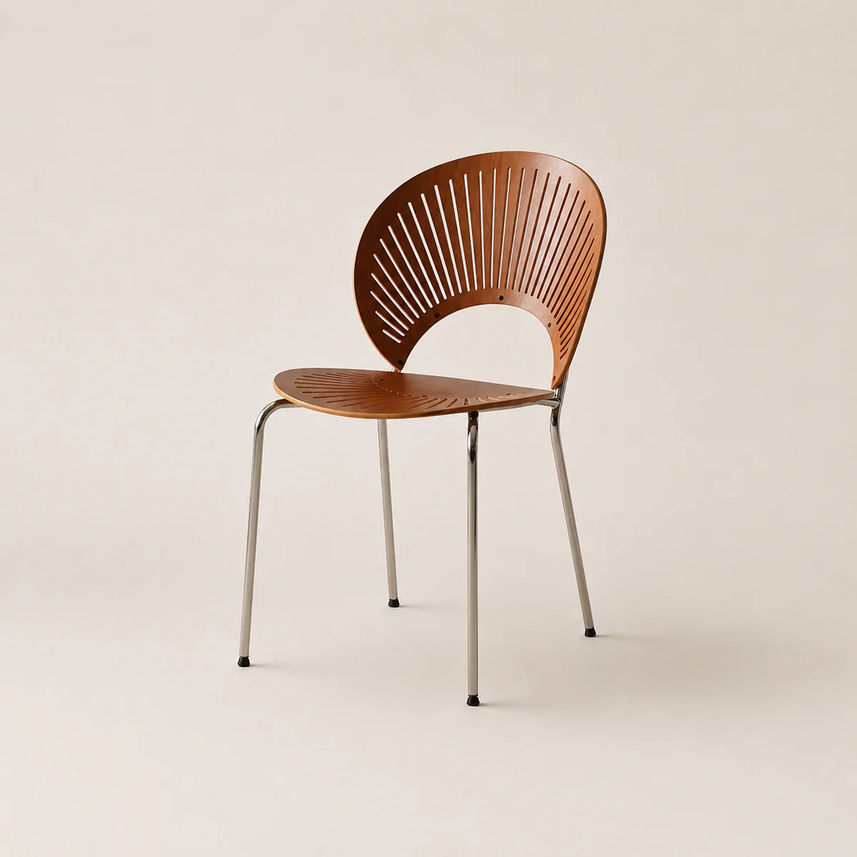 Wooden chair with metal legs on a beige background