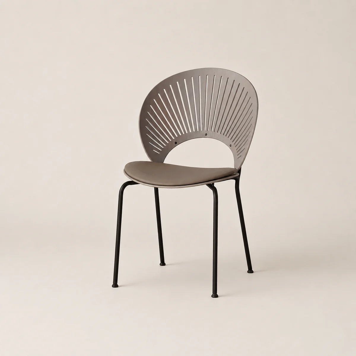 Modern chair with a unique back design on a beige background