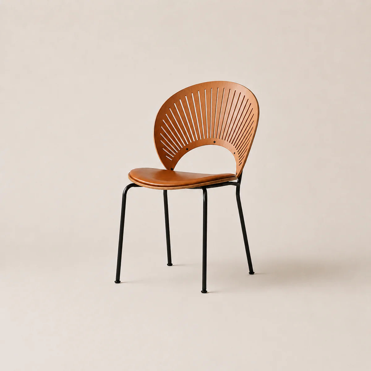 Wooden chair with black metal legs on a beige background